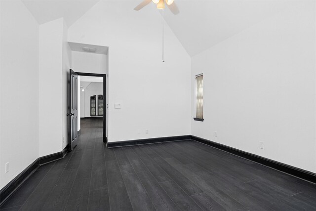 4160 Towne Green Cir, Addison, TX 75001 - empty room featuring a ceiling fan, dark wood-style floors, high vaulted ceiling, and baseboards