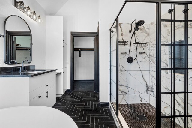 4160 Towne Green Cir, Addison, TX 75001 - full bathroom with a shower stall, vanity, a freestanding tub, and brick patterned flooring