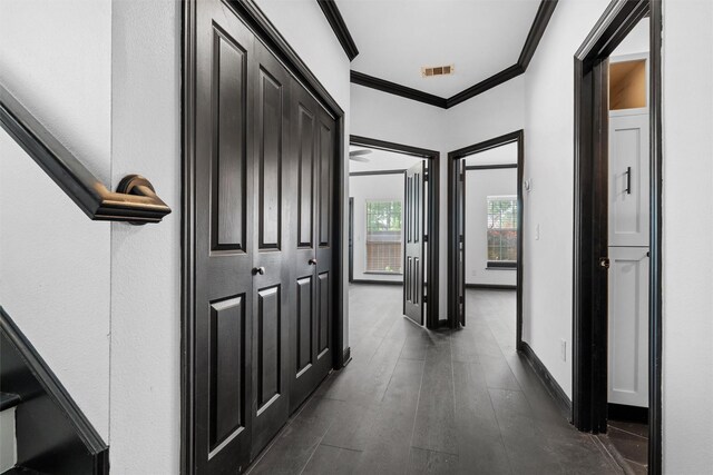 4160 Towne Green Cir, Addison, TX 75001 - hallway featuring ornamental molding, dark wood finished floors, and baseboards