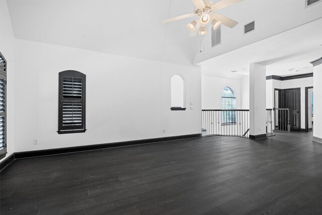 4160 Towne Green Cir, Addison, TX 75001 - unfurnished room featuring dark wood finished floors, a ceiling fan, and baseboards