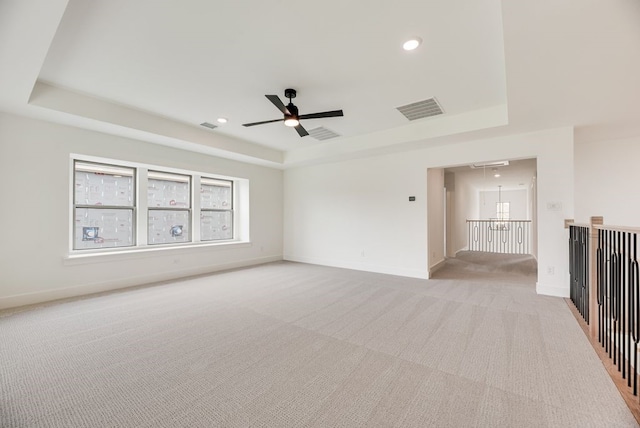 3340 Crescent Ln, Celina, TX 75009 - spare room featuring a tray ceiling, ceiling fan, attic access, light colored carpet, and recessed lighting