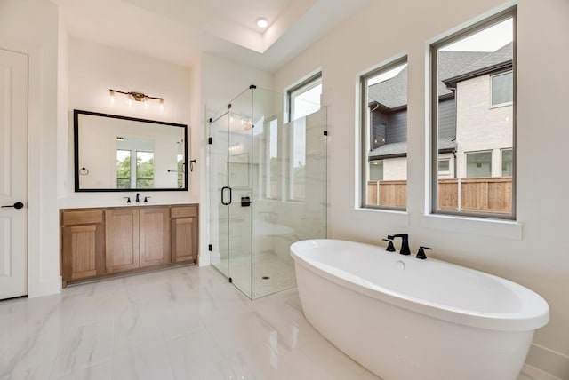 3340 Crescent Ln, Celina, TX 75009 - bathroom with a shower stall, marble finish flooring, a freestanding bath, and vanity