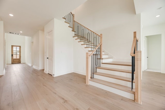 3340 Crescent Ln, Celina, TX 75009 - staircase with wood finished floors and recessed lighting