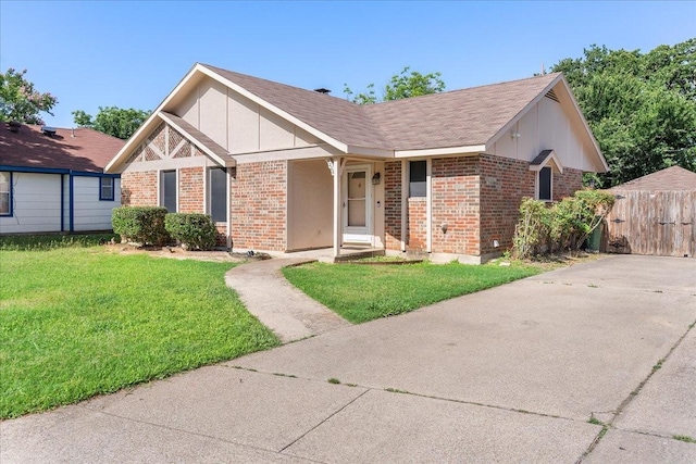 4206 Windhurst Dr, Arlington, TX 76015 - view of front of property with brick siding and board and batten siding