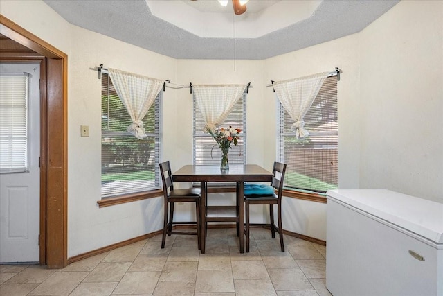 4206 Windhurst Dr, Arlington, TX 76015 - dining space featuring baseboards and ceiling fan