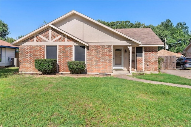 4206 Windhurst Dr, Arlington, TX 76015 - view of front of property featuring a front lawn and brick siding