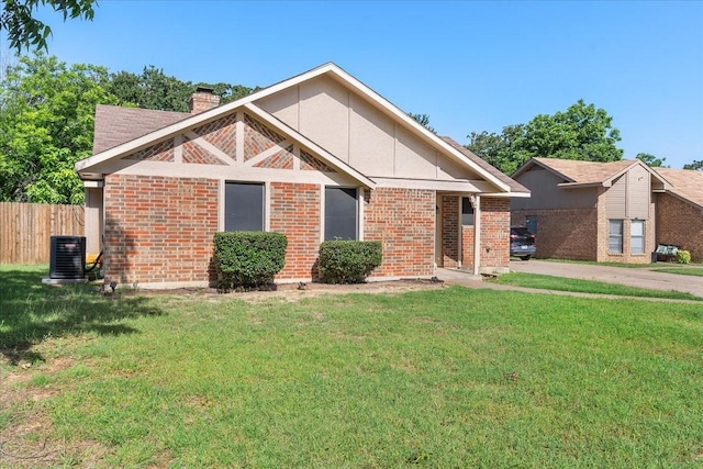 4206 Windhurst Dr, Arlington, TX 76015 - view of front of home featuring a chimney, cooling unit, and brick siding