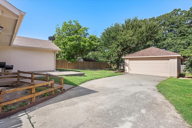 4206 Windhurst Dr, Arlington, TX 76015 - view of yard with a garage and an outbuilding
