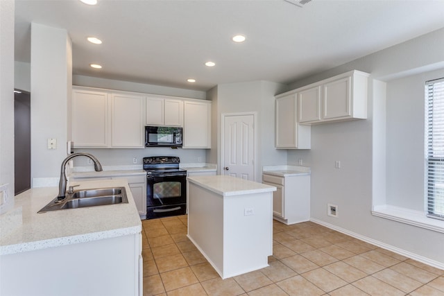 536 Kerry St, Crowley, TX 76036 - kitchen featuring black appliances, a sink, recessed lighting, white cabinets, and light tile patterned flooring