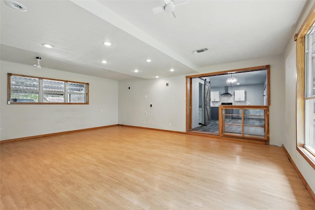 1317 Elby St, Irving, TX 75061 - unfurnished living room with a ceiling fan, light wood-type flooring, baseboards, and recessed lighting