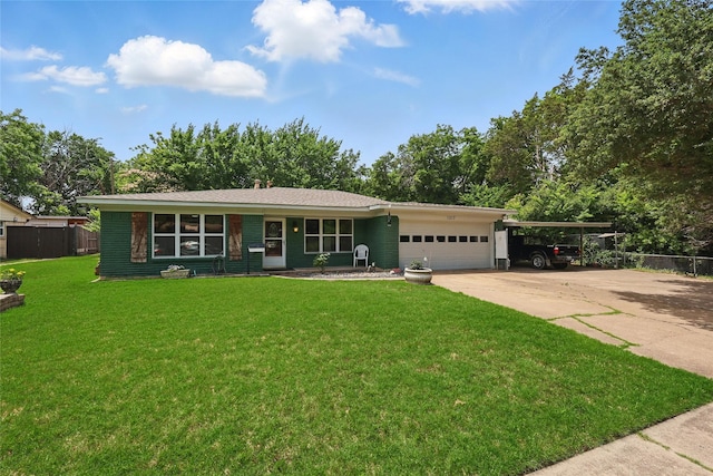 1317 Elby St, Irving, TX 75061 - view of front of property with an attached garage, concrete driveway, and a carport