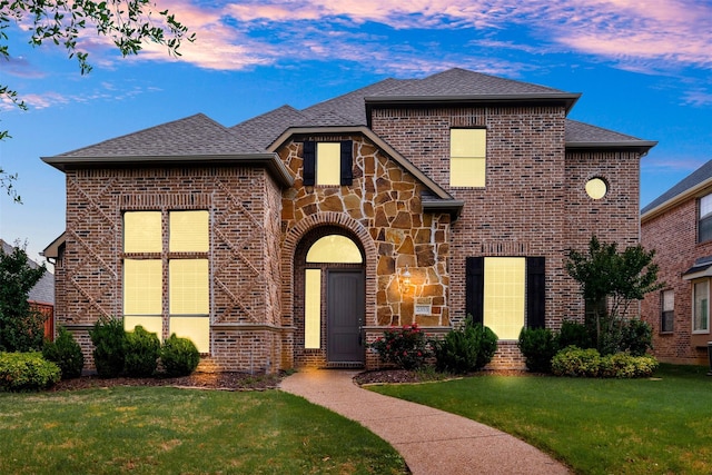 2353 Salisbury Ct, The Colony, TX 75056 - view of front facade featuring brick siding, a yard, and a shingled roof