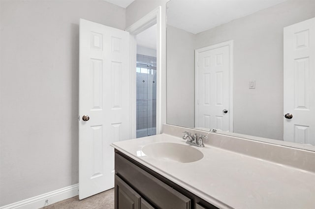 2353 Salisbury Ct, The Colony, TX 75056 - bathroom with baseboards, vanity, and a shower