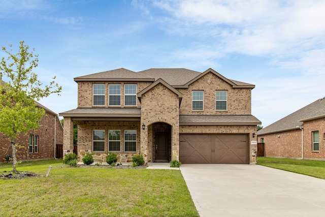 1304 Villalonga Dr, Little Elm, TX 75068 - view of front of property with brick siding, a garage, driveway, and a front yard