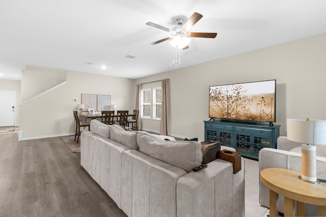 1304 Villalonga Dr, Little Elm, TX 75068 - living room with ceiling fan, wood finished floors, and baseboards