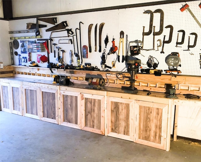 783 County Rd 4420, Whitewright, TX 75491 - misc room with concrete flooring and a workshop area