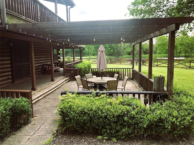 783 County Rd 4420, Whitewright, TX 75491 - view of patio with outdoor dining area, a pergola, and a wooden deck