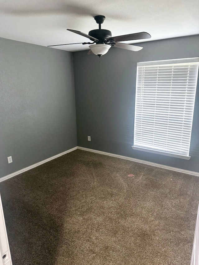 826 E Center St, Duncanville, TX 75116 - empty room featuring a ceiling fan, carpet floors, and baseboards