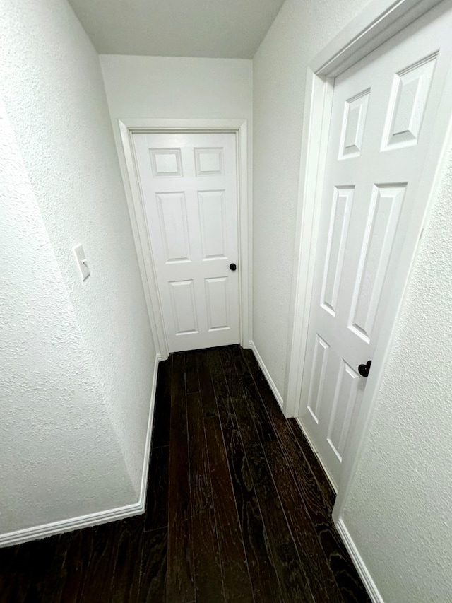 826 E Center St, Duncanville, TX 75116 - hall featuring dark wood-type flooring and a textured wall
