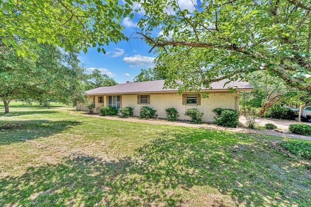 1700 Sunset Rd, Robinson, TX 76706 - single story home featuring brick siding and a front yard