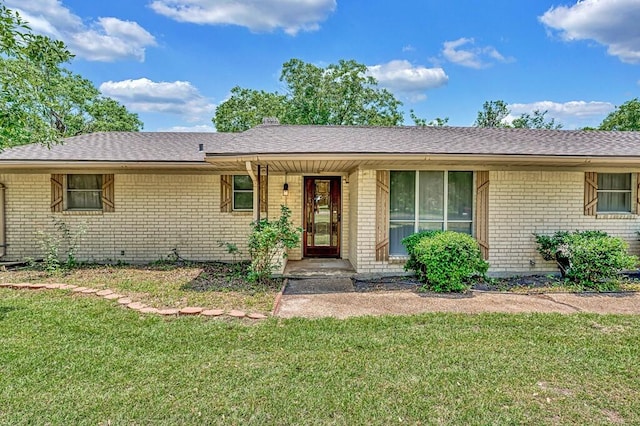 1700 Sunset Rd, Robinson, TX 76706 - single story home with brick siding, a front yard, roof with shingles, and covered porch
