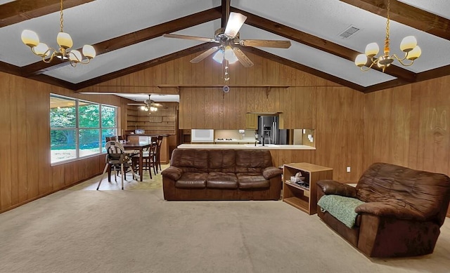 1700 Sunset Rd, Robinson, TX 76706 - carpeted living room featuring a chandelier, wooden walls, a sink, and a ceiling fan