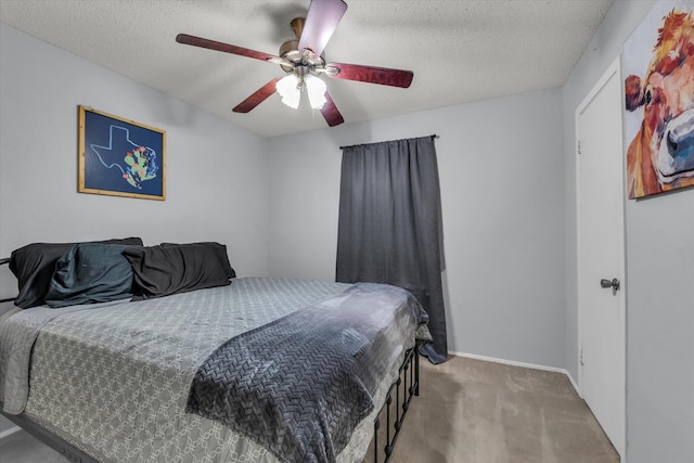 1313 Crow Dr, Waco, TX 76705 - bedroom with carpet floors, ceiling fan, a textured ceiling, and baseboards