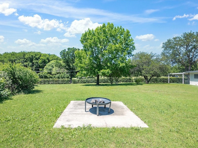 360 Diamond Bar Trl, Aledo, TX 76008 - view of grassy yard with an outdoor fire pit and a patio area