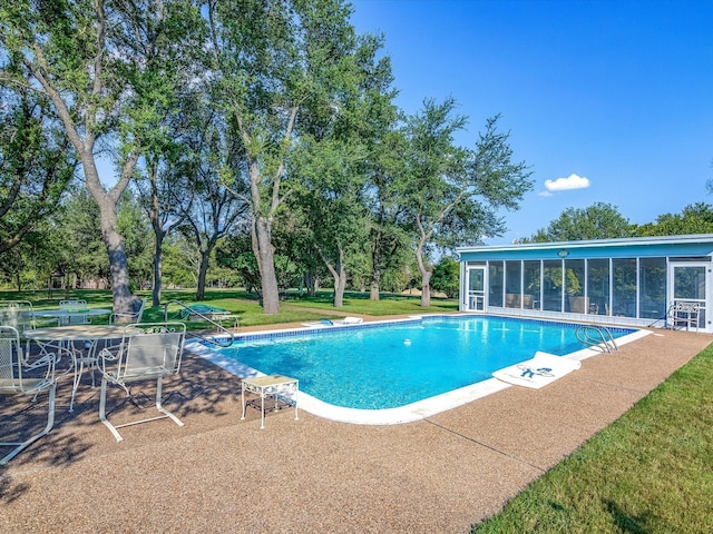 360 Diamond Bar Trl, Aledo, TX 76008 - swimming pool featuring a sunroom, a patio area, a lawn, and view of wooded area