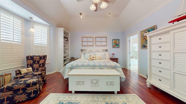 7534 Wellesley Ave, Garland, TX 75044 - bedroom featuring multiple windows, dark wood-type flooring, crown molding, and lofted ceiling