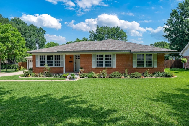 1209 Redbud Dr, Arlington, TX 76012 - single story home featuring brick siding, an attached garage, and driveway