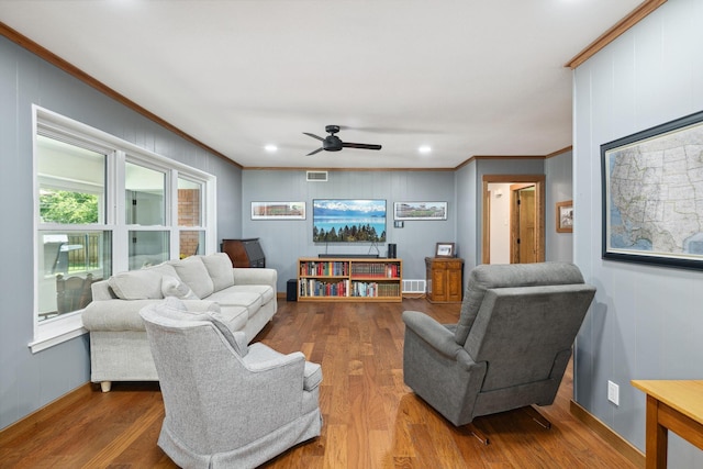 1209 Redbud Dr, Arlington, TX 76012 - living area with ornamental molding, wood finished floors, a ceiling fan, recessed lighting, and baseboards