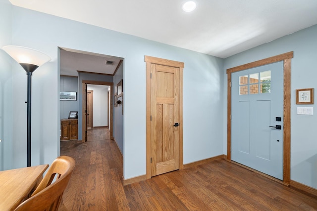 1209 Redbud Dr, Arlington, TX 76012 - entryway with dark wood-type flooring and baseboards