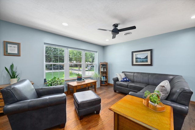 1209 Redbud Dr, Arlington, TX 76012 - living room featuring a ceiling fan, wood finished floors, and recessed lighting