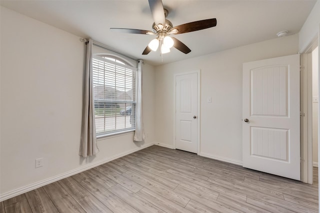 6100 Fall Creek Ln, Fort Worth, TX 76123 - unfurnished bedroom featuring light wood-style flooring, baseboards, and ceiling fan