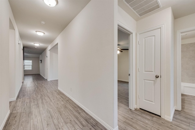 6100 Fall Creek Ln, Fort Worth, TX 76123 - corridor featuring light wood finished floors and baseboards
