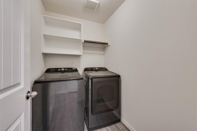 6100 Fall Creek Ln, Fort Worth, TX 76123 - laundry room featuring washer and clothes dryer and baseboards