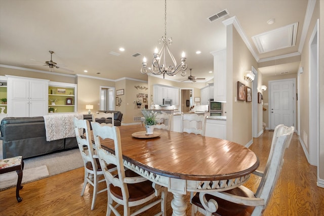 5505 Moorewood Dr, Arlington, TX 76017 - dining space featuring ceiling fan, baseboards, light wood-type flooring, a chandelier, and recessed lighting