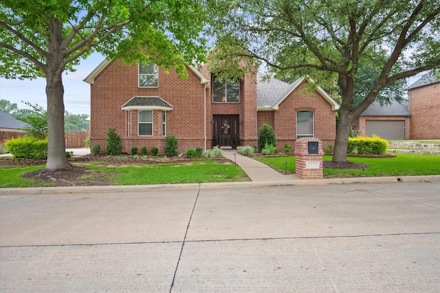 5505 Moorewood Dr, Arlington, TX 76017 - traditional-style house with brick siding and roof with shingles