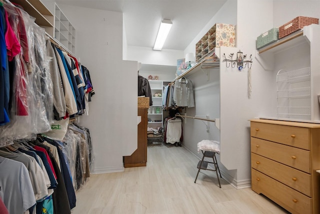 5505 Moorewood Dr, Arlington, TX 76017 - walk in closet featuring light wood-type flooring