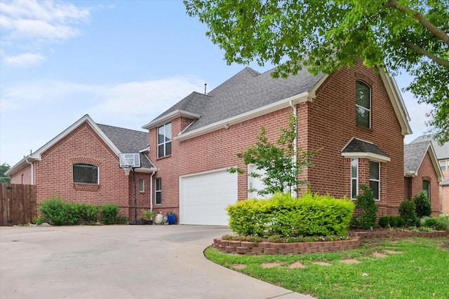 5505 Moorewood Dr, Arlington, TX 76017 - view of front of property featuring brick siding, concrete driveway, roof with shingles, and a garage