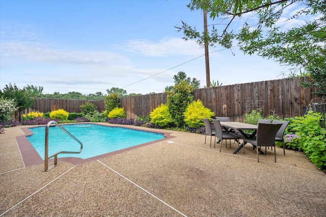 5505 Moorewood Dr, Arlington, TX 76017 - view of swimming pool with a patio area, a fenced backyard, and outdoor dining space