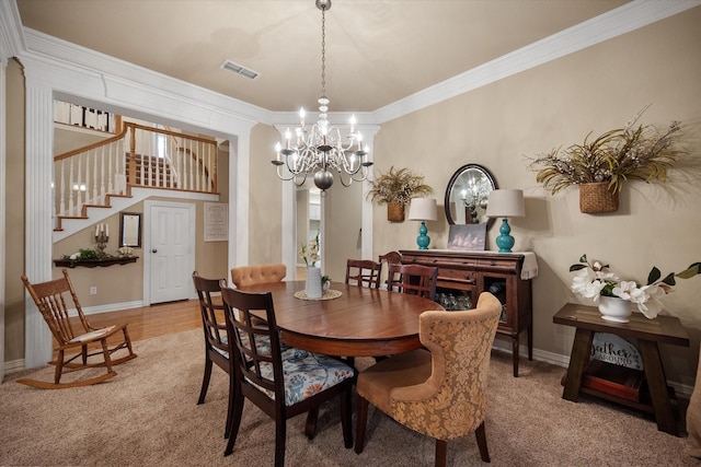 5505 Moorewood Dr, Arlington, TX 76017 - dining room featuring a chandelier, stairs, crown molding, light colored carpet, and baseboards