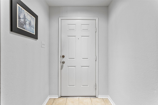 12701 Seagull Way, Frisco, TX 75036 - entryway featuring light tile patterned flooring and baseboards