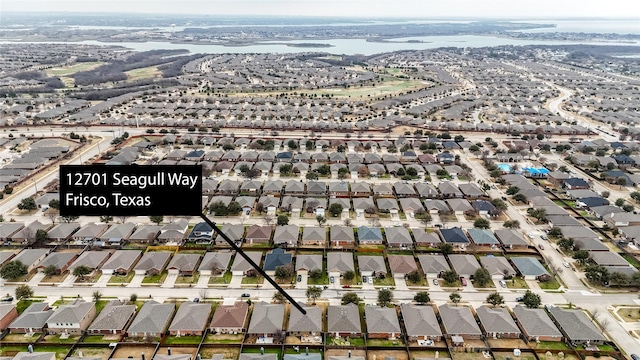 12701 Seagull Way, Frisco, TX 75036 - aerial view of property and surrounding area with nearby suburban area and a large body of water