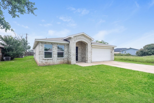234 Backlash Dr, Gun Barrel City, TX 75156 - view of front facade featuring cooling unit, a garage, driveway, a front yard, and brick siding