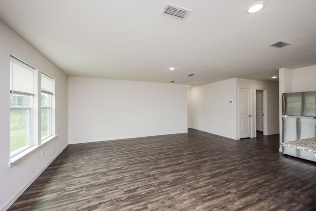 234 Backlash Dr, Gun Barrel City, TX 75156 - empty room featuring dark wood-type flooring, recessed lighting, and baseboards