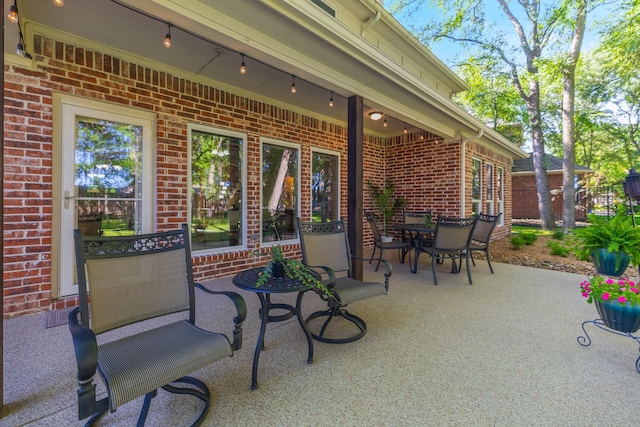 18 Oxford Way, Allen, TX 75002 - view of patio / terrace featuring outdoor dining space