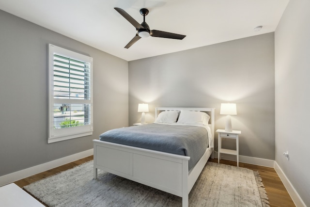 3900 Dalea Dr, Prosper, TX 75078 - bedroom with wood finished floors, baseboards, and a ceiling fan