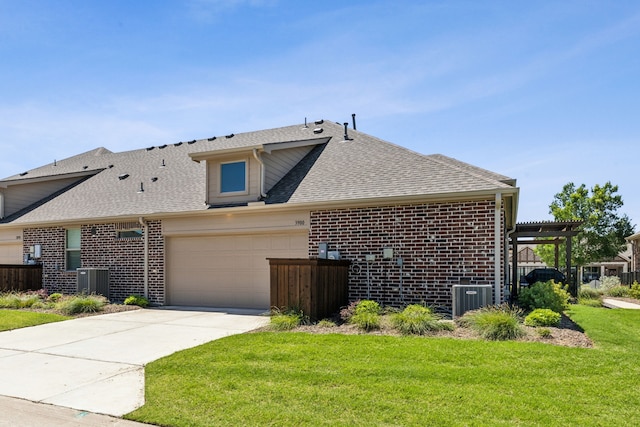 3900 Dalea Dr, Prosper, TX 75078 - view of property exterior with brick siding, an attached garage, a shingled roof, and concrete driveway